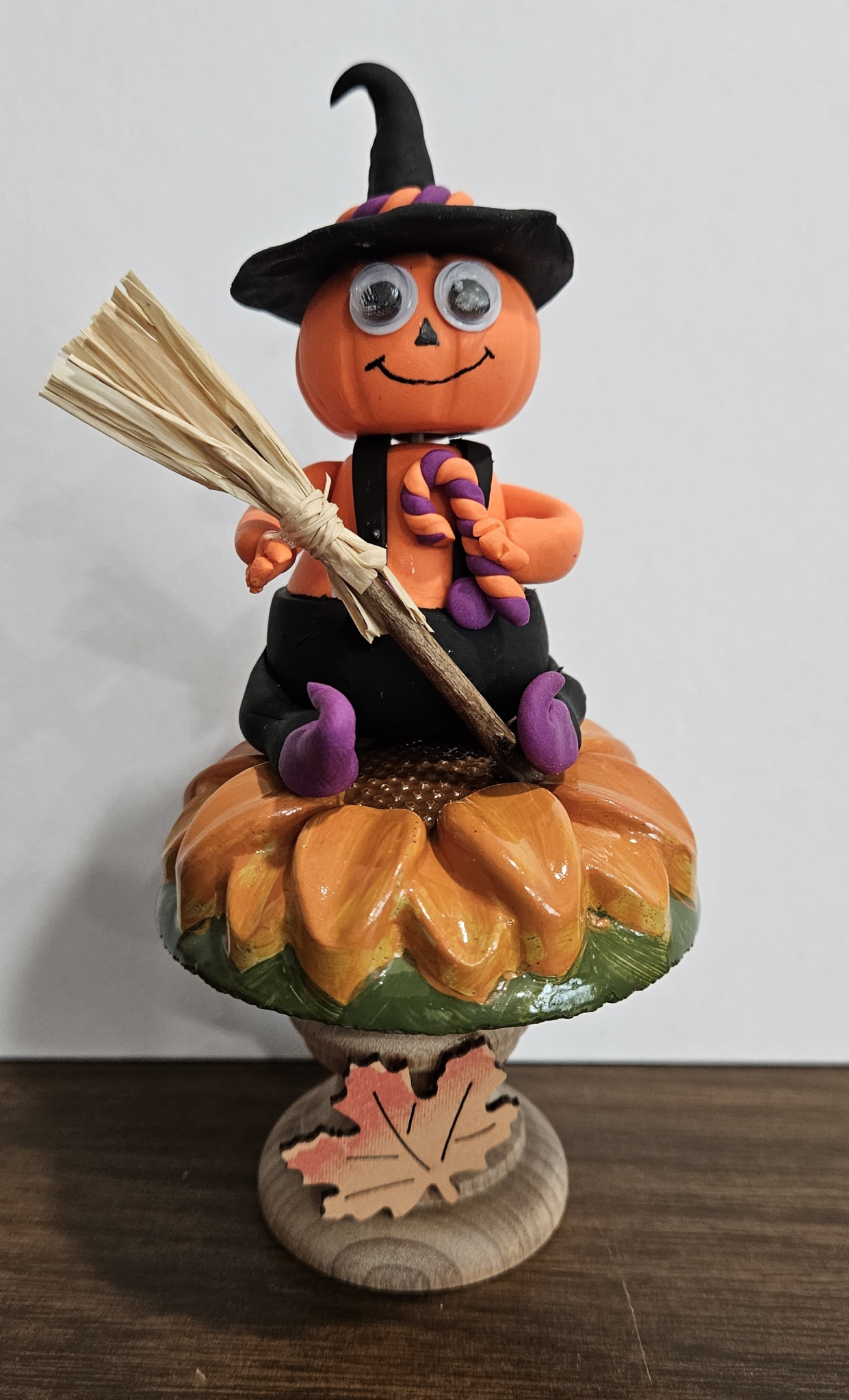 Click here to view Pumpkin Man on Pedestal Halloween by  
